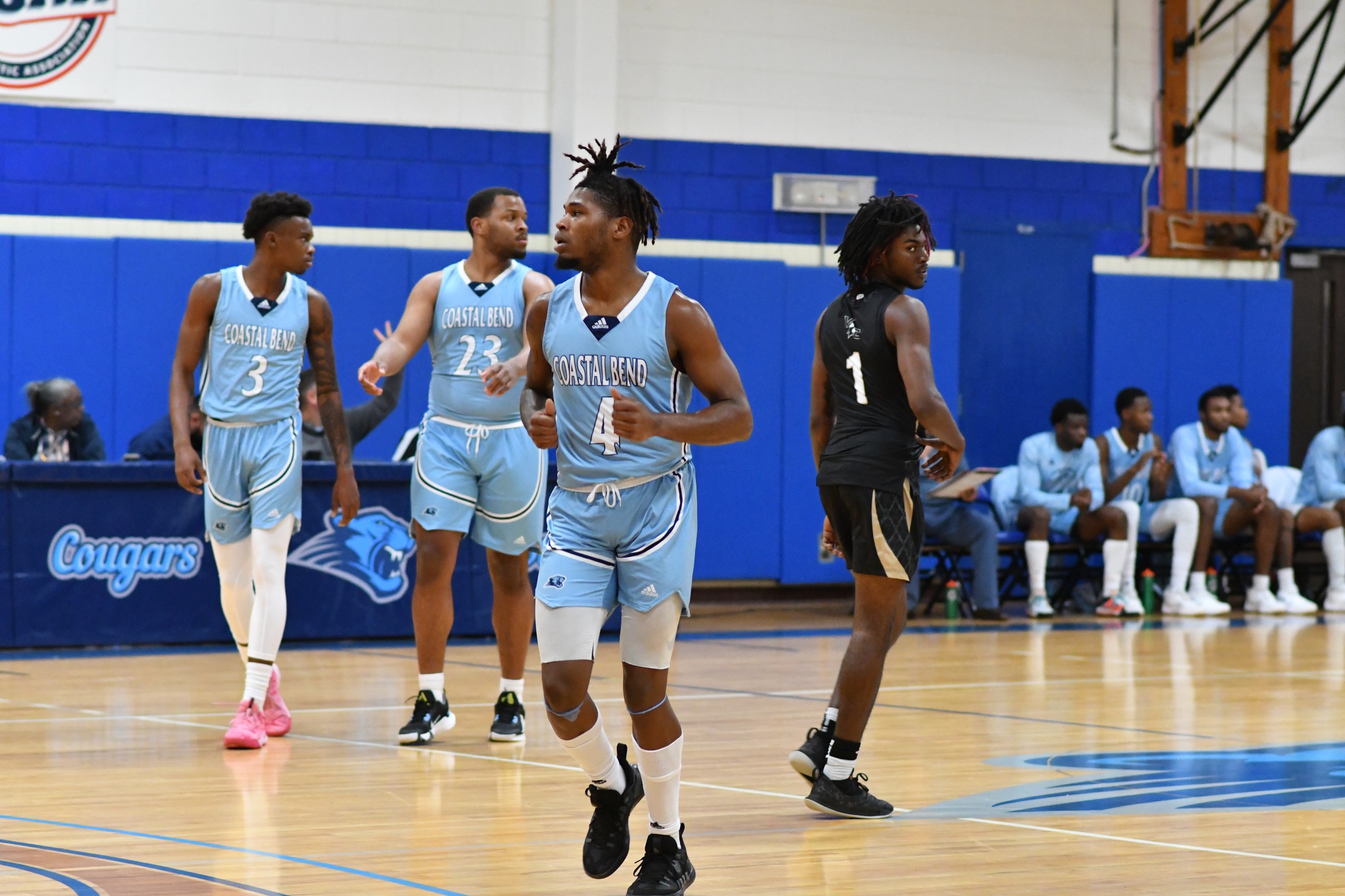 Cougars Late Surge Clips Cardinals; Improve to 2-1 in Conference