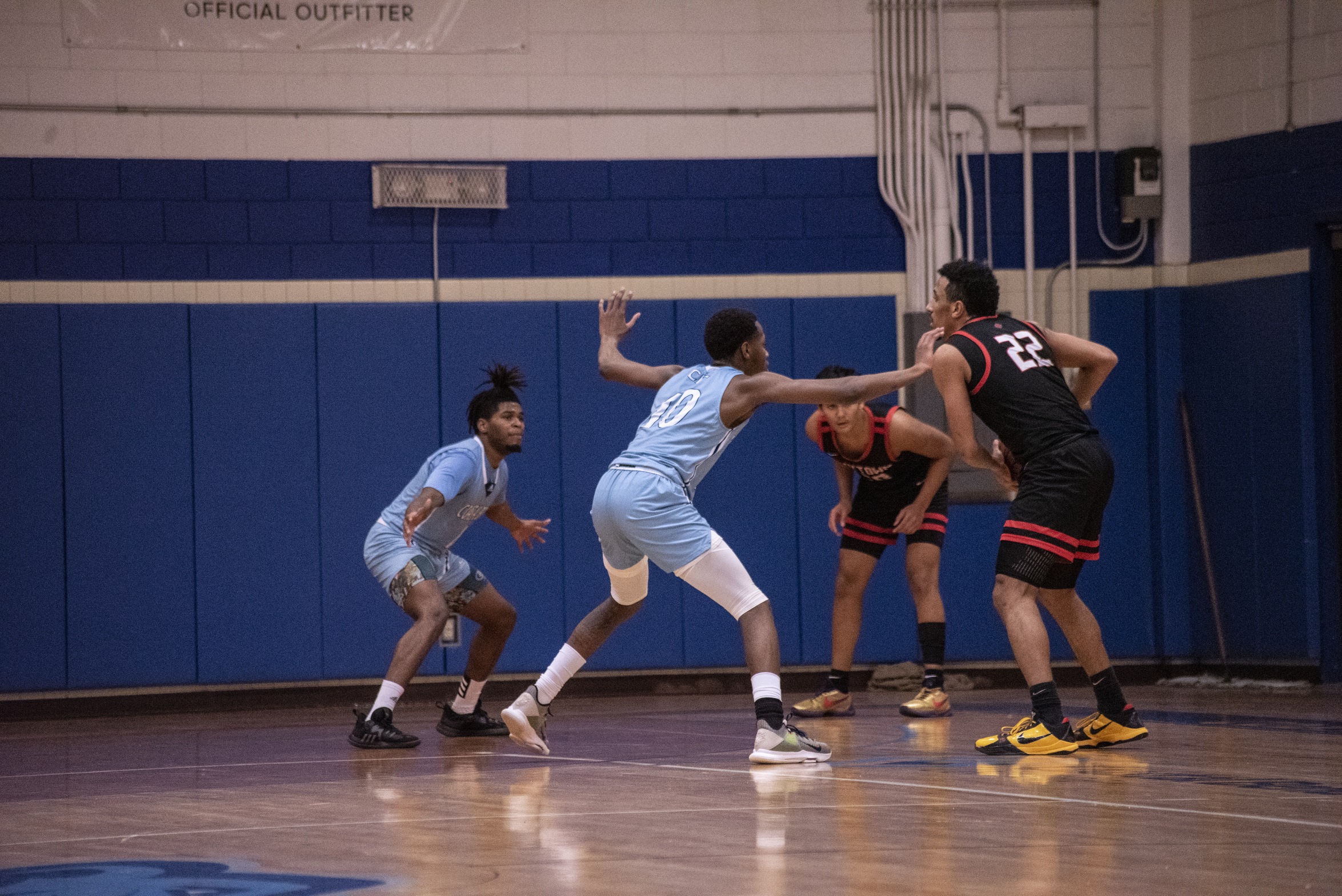 Freshmen Jamil Muttilib and Peter McKey defend The Den in front of a raucous crowd.