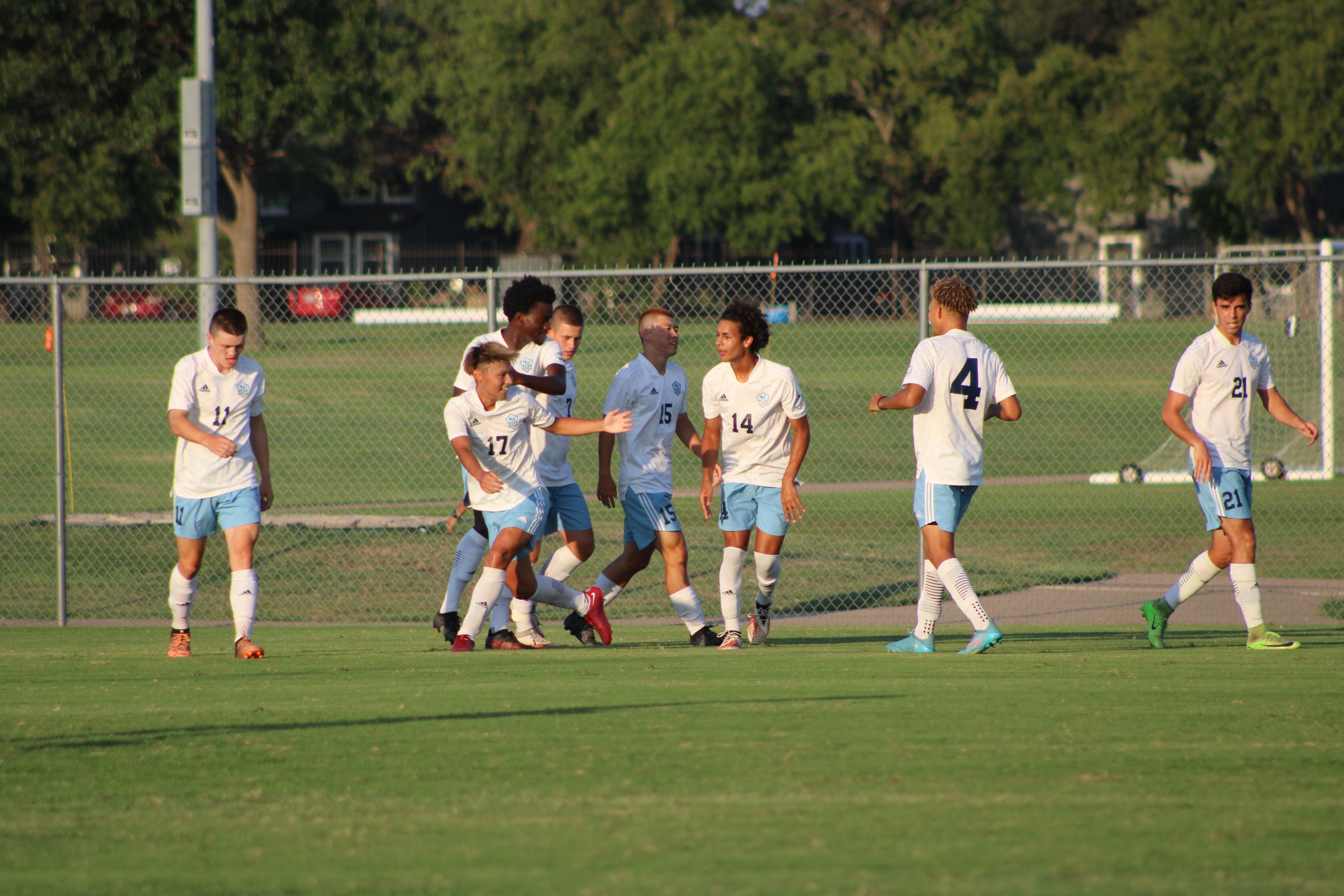 Cougars Split Season Opener in Dallas