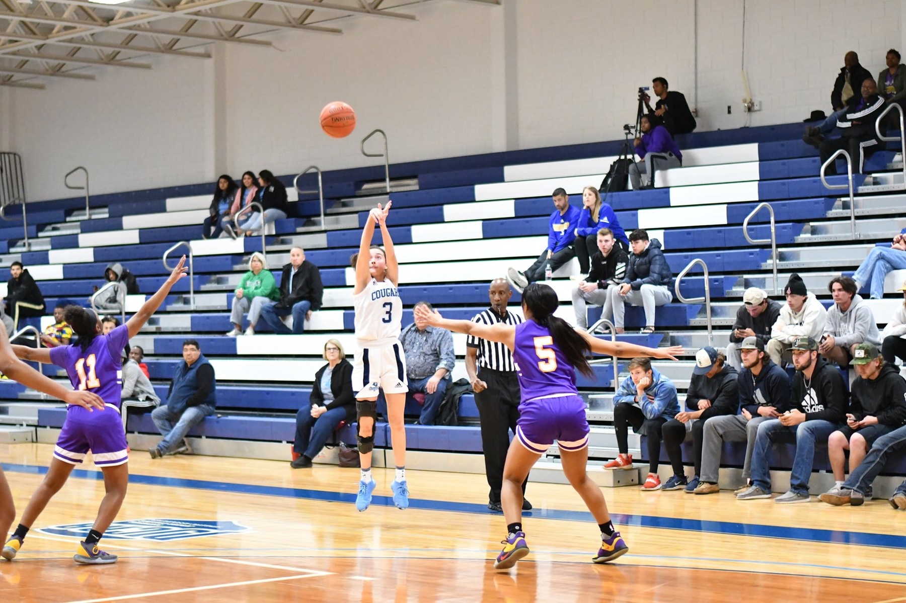 Cougars Fall Close at Home